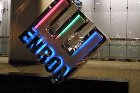 Enron logo on a glass door.